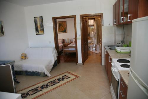 Una cocina o kitchenette en Apartments Oasis