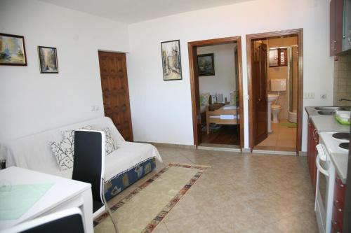 Una cocina o kitchenette en Apartments Oasis