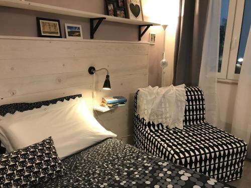 Ένα ή περισσότερα κρεβάτια σε δωμάτιο στο La Casa Blu