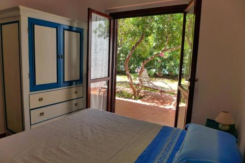 Un pat sau paturi într-o cameră la B&B Vacanza Facile