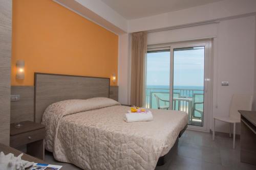 Posteľ alebo postele v izbe v ubytovaní Hotel Altis