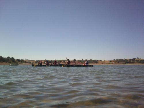 a group of people in boats on the water at Route 2 Torrão in Torrão