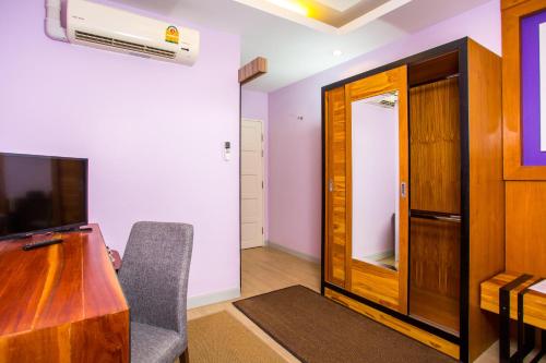 TV a/nebo společenská místnost v ubytování Triple B Boutique Residence