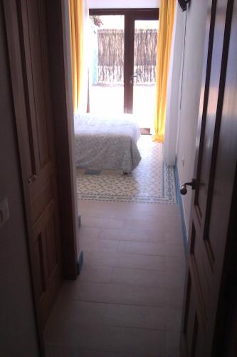 Ένα ή περισσότερα κρεβάτια σε δωμάτιο στο La casita azul