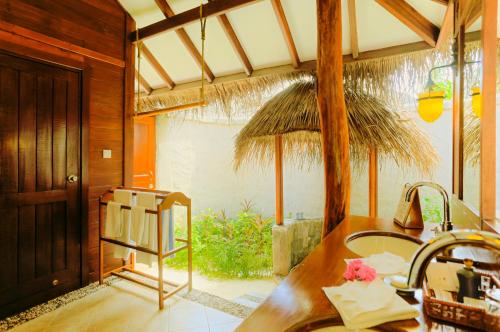 Zahrada ubytování Medhufushi Island Resort