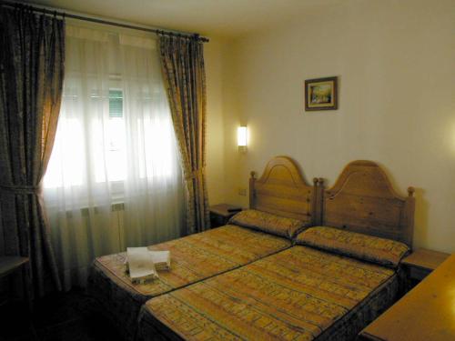 Ένα ή περισσότερα κρεβάτια σε δωμάτιο στο Gabarre