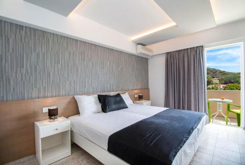 Katil atau katil-katil dalam bilik di CasaStavris - Aparts & Pool Suites