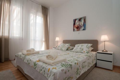 Iva, Opatija centar