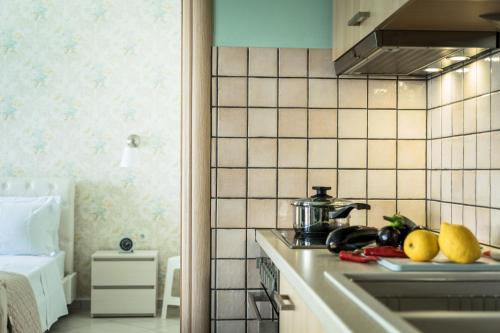 Køkken eller tekøkken på Melina Apartments Pool View