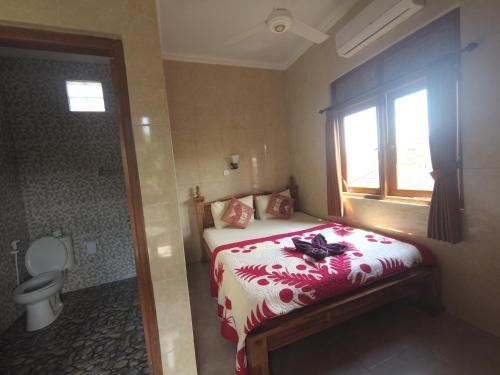 Cama o camas de una habitación en Rumah Ary Homestay & Spa