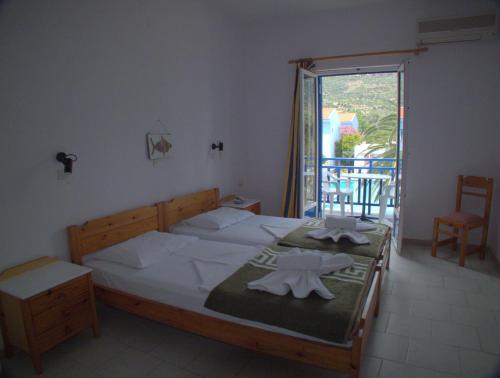 Llit o llits en una habitació de Hotel Sofia