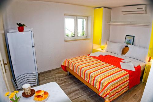 Postel nebo postele na pokoji v ubytování Studio Apartman Papić