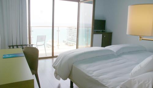 Katil atau katil-katil dalam bilik di Hotel Ritual Torremolinos- Adults Only