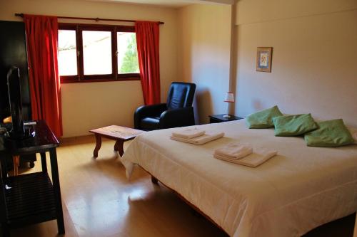 Ένα ή περισσότερα κρεβάτια σε δωμάτιο στο Pura Vida Hosteria