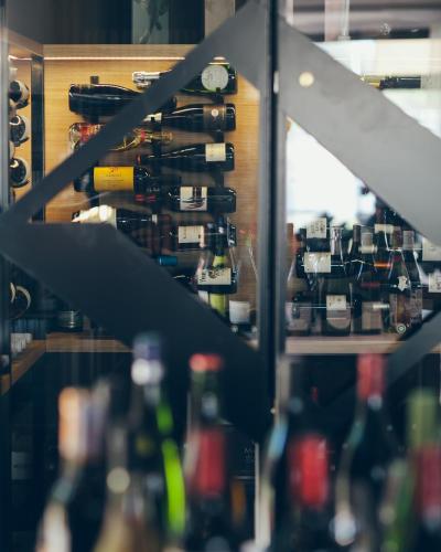 a view of a wine cellar with wine bottles at Hôtel & Spa Villa Seren in Hossegor