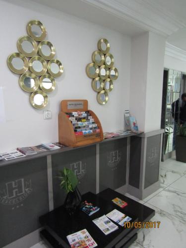 a store with plates hanging on the wall at Hotel Excelsior in Lisbon