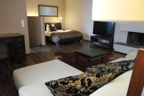 Una cama o camas en una habitación de Pension Leichtfried