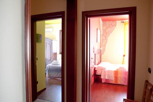 Llit o llits en una habitació de B&B Raffiori