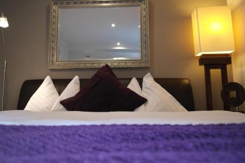 Una cama o camas en una habitación de Pension Leichtfried