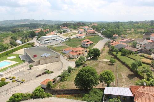 an aerial view of a small town with a street at Hotel Medieval® de Penedono in Penedono
