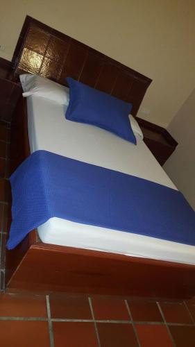 Ein Bett oder Betten in einem Zimmer der Unterkunft Hotel Sandiego inc