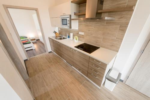 Η κουζίνα ή μικρή κουζίνα στο Apartmany 154