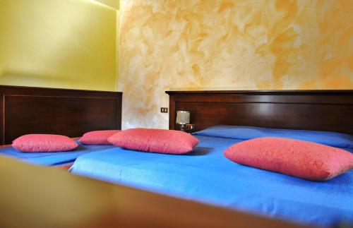 Katil atau katil-katil dalam bilik di Albergo Miramonti