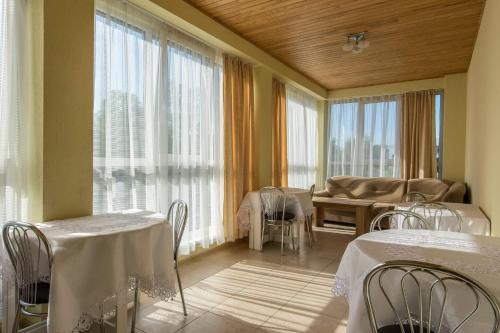 Postel nebo postele na pokoji v ubytování Vila Uosis