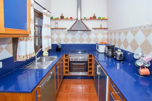 Villa Vistafuerteにあるキッチンまたは簡易キッチン