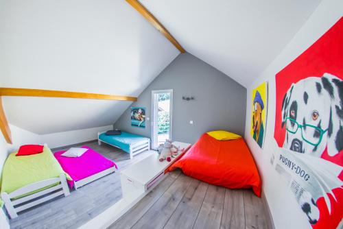 Postel nebo postele na pokoji v ubytování Gîte LaurieRaphael