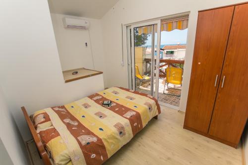 Katil atau katil-katil dalam bilik di Holiday Home Siesta