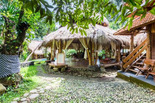 Zahrada ubytování Omunity Bali