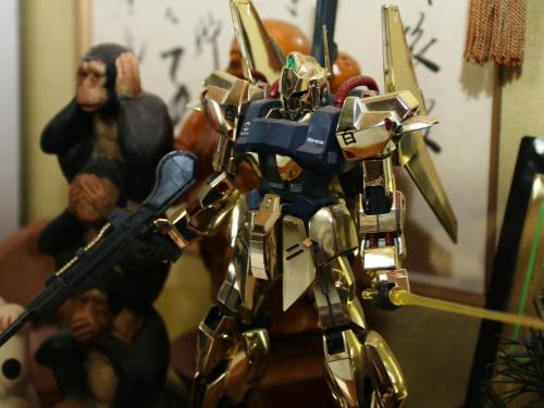a close up of a toy transformer holding a gun at Marumo Ryokan in Takashima