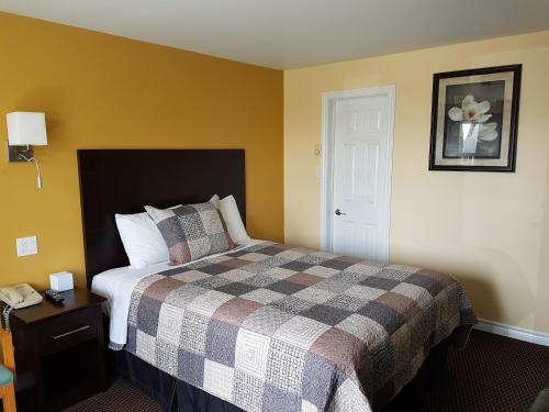 Cama o camas de una habitación en Fox Motor Inn