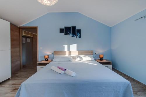 Postel nebo postele na pokoji v ubytování Apartman Leon & rent a quad