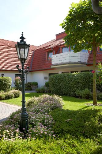 Κήπος έξω από το Grothenns Hotel 3-Sterne superior