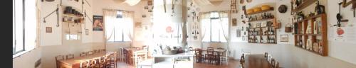 a room with tables and chairs in a store at Agriturismo Battibue in Fiorenzuola dʼArda