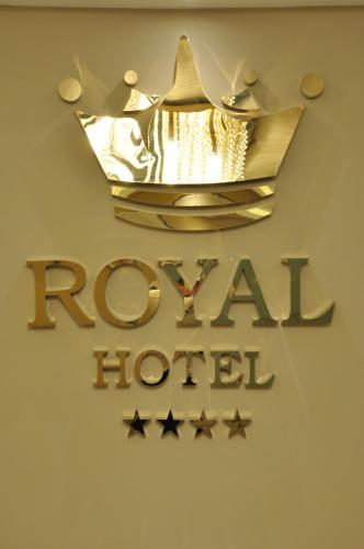 a sign for the rolex hotel with stars at Royal Hotel Inegol in Inegol