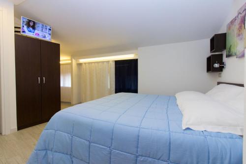 Postel nebo postele na pokoji v ubytování Albergo Romagna
