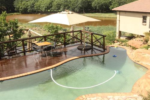 Kolam renang di atau di dekat Heidelberg Kloof Lodge