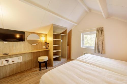 Postel nebo postele na pokoji v ubytování Center Parcs Les Ardennes