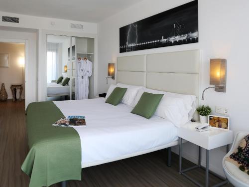 En eller flere senger på et rom på Axel Beach Ibiza - Adults Only