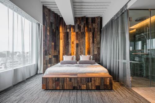 Una cama o camas en una habitación de ONE@Tokyo