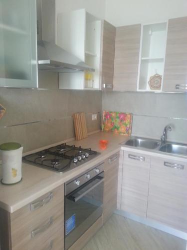 Η κουζίνα ή μικρή κουζίνα στο Appartamento Belvedere