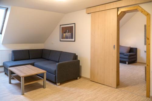 Zona de estar de Pension & Reitstall Inghofer