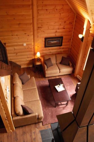 Selenia Lodge- Résidences et Chalets dans les Laurentidesにあるシーティングエリア