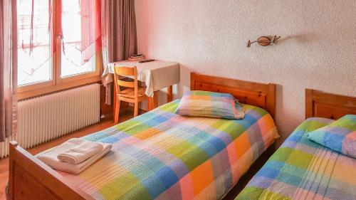 Postel nebo postele na pokoji v ubytování Hotel Restaurant Monte Leone