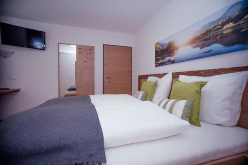Postel nebo postele na pokoji v ubytování Inn-Apartments