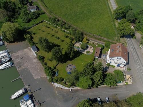 an aerial view of a house with a yard at Domaine du Port Sainte Marie in Maizières-lès-Vic