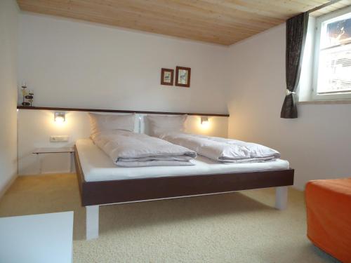 Ein Bett oder Betten in einem Zimmer der Unterkunft Appartement Pleikner